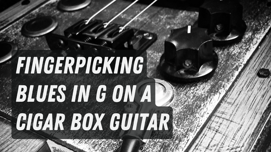 Fingerpicking Blues in G on a cigar box guitar