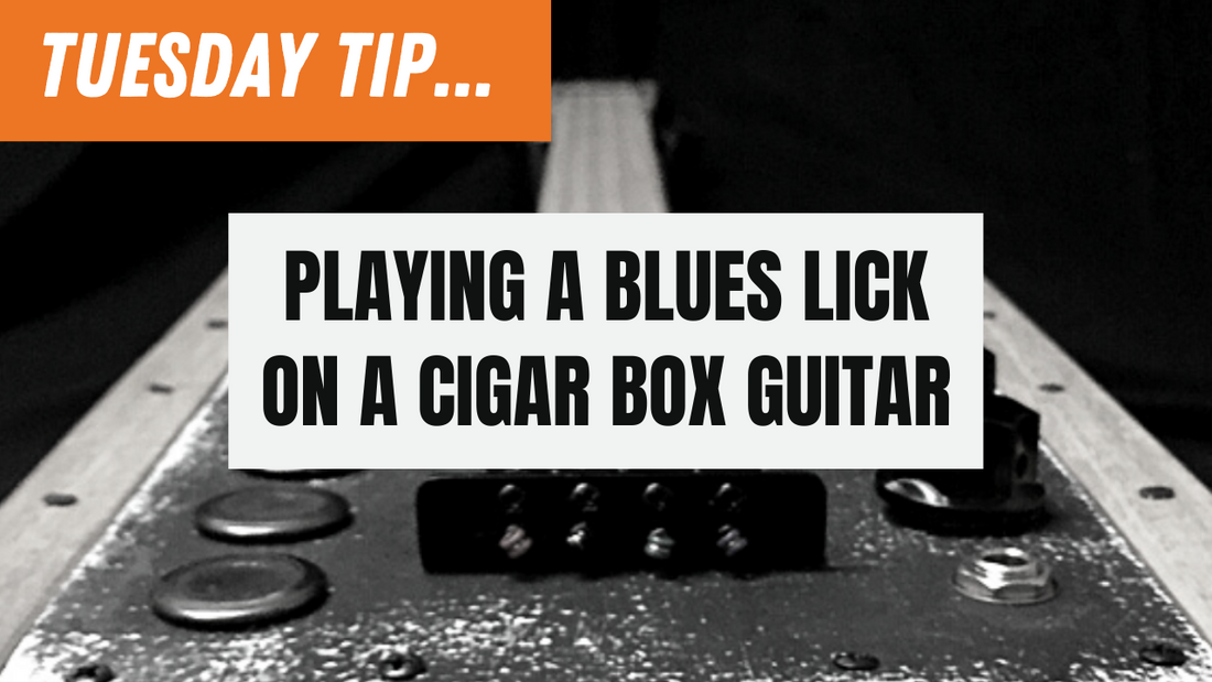 Playing a Blues Lick on a cigar box guitar